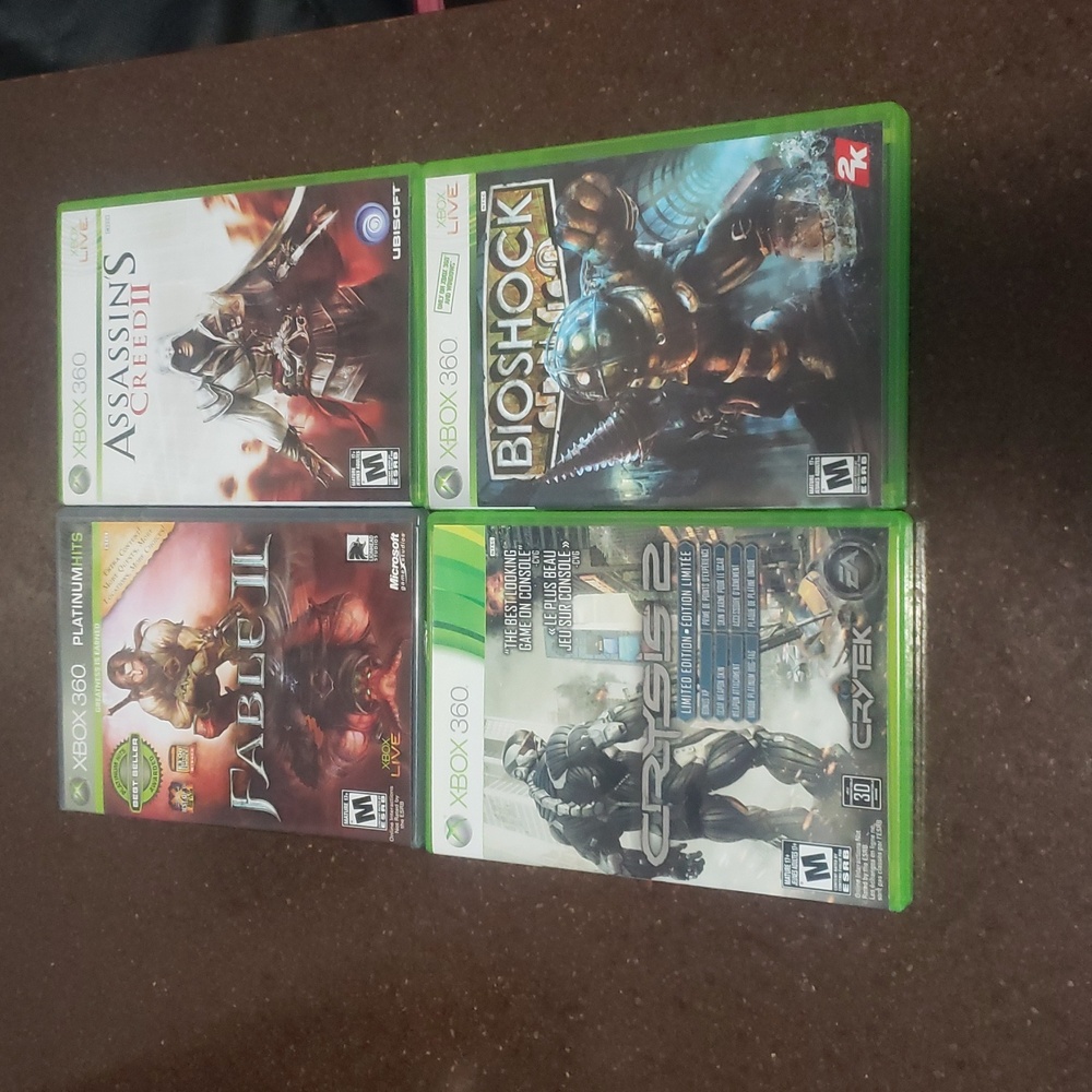 Lot of 4 X-BOX 360 Games- Fable II, Assassin's Creed II, Crysis 2 and Bioshock.